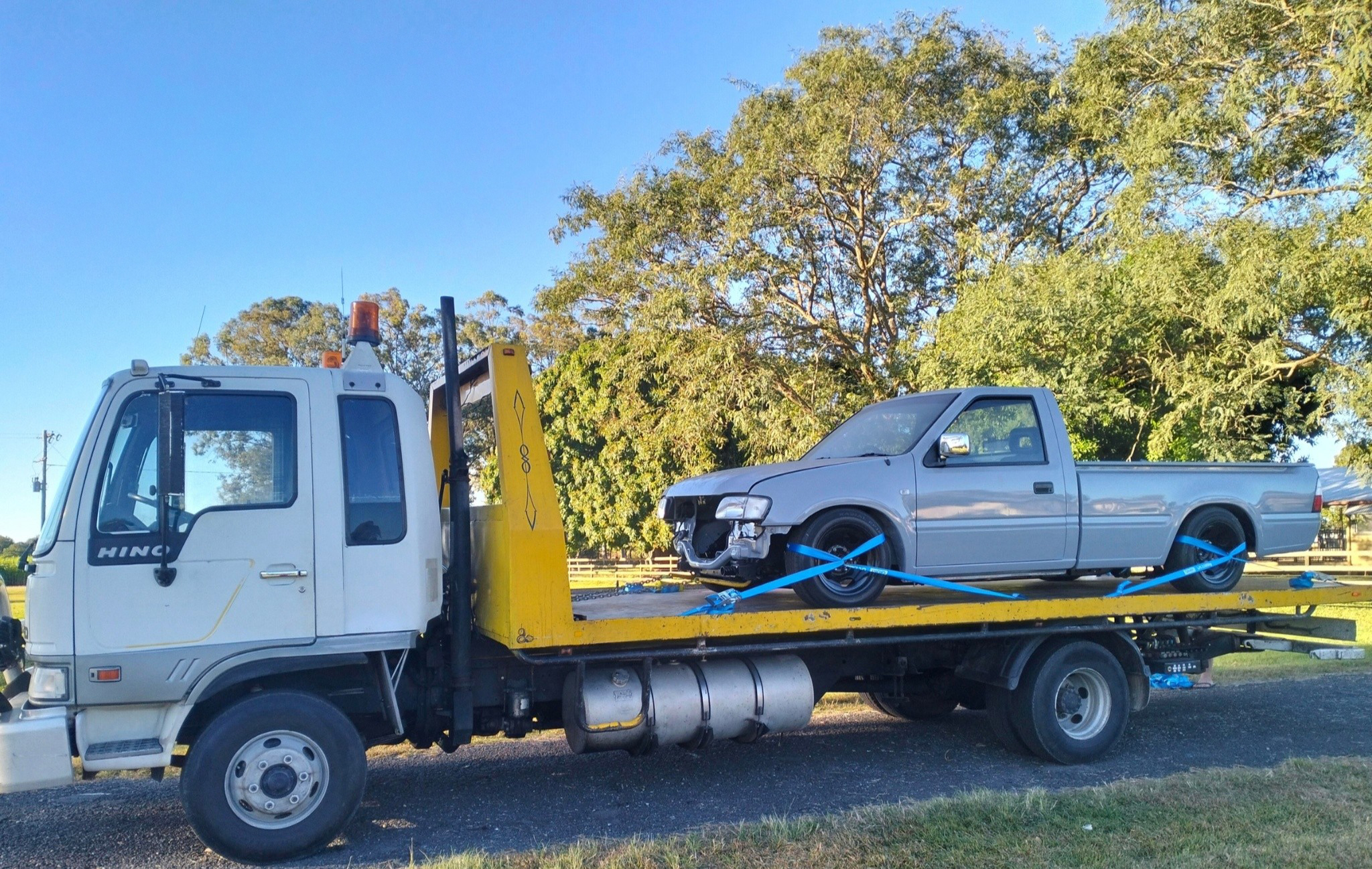 Tilt tray towing truck ready for vehicle transport